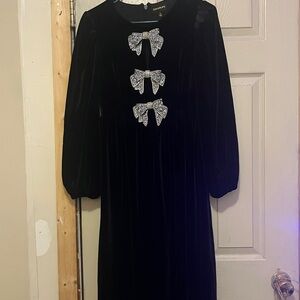 Elegant Black Midi Dress with Bow Accents